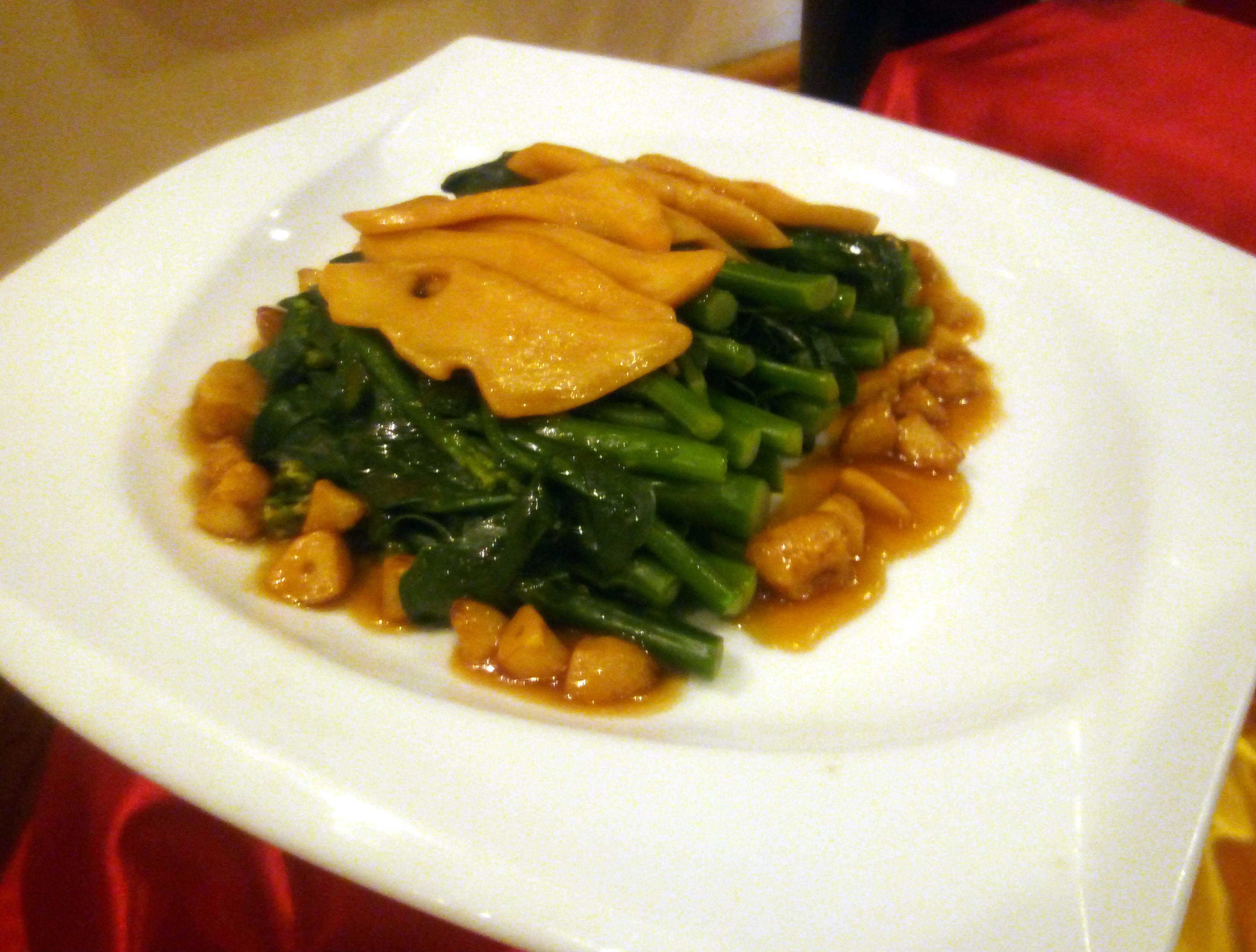 Braised Top Shell Abalone Slice with Hong Kong Kai Lan and Roast Garlic